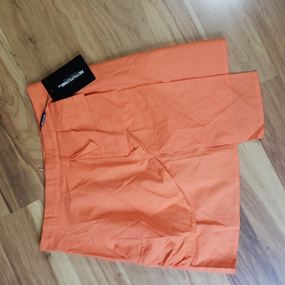 NWT Pretty Little Thing orange drape mini skirt